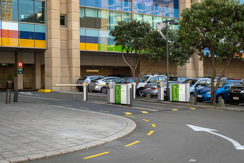 View of the entrance to Te Papa’s car park, showing the ticket booth and boom gates