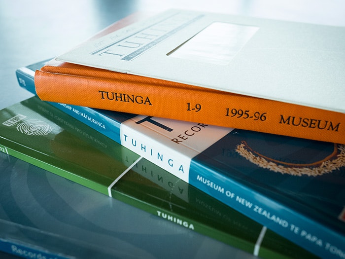 Issues of Tuhinga, 2017. Photograph by Daniel Crichton-Rouse. Te Papa A pile of Tuhinga issues on a table