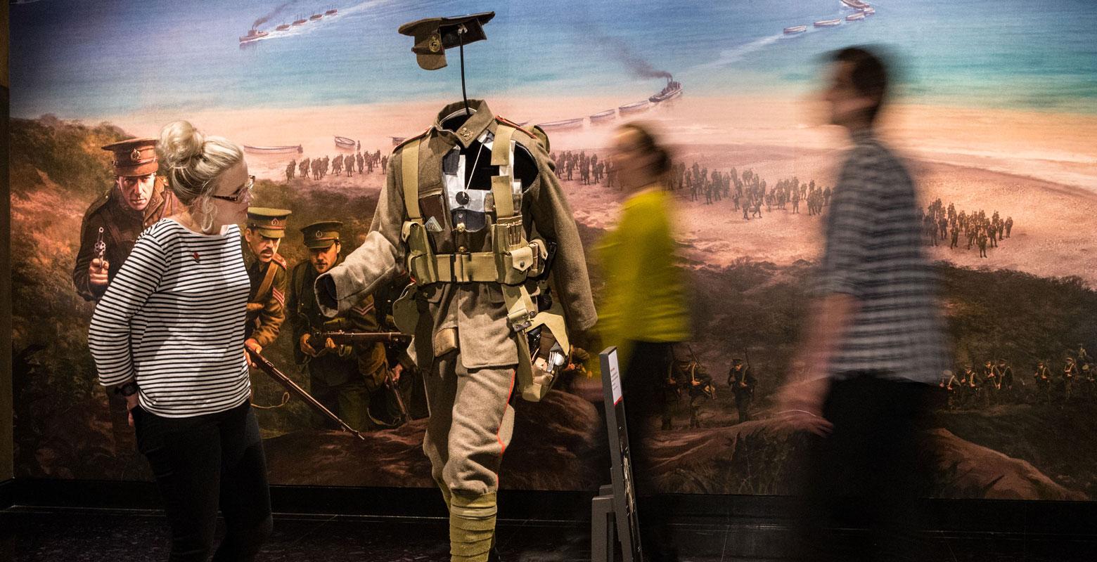 Visitors examine the cut-through model of soldiers' kit