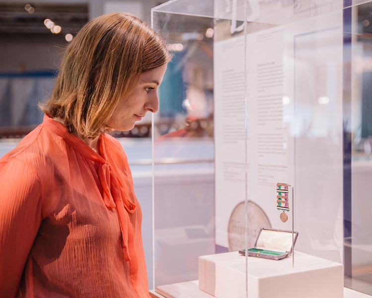 Person looking at medal