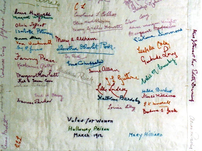 Handkerchief featuring the embroidered signatures of Frances Parker and 65 fellow suffragettes who were held at Holloway Prison, 1912. It is believed that the handkerchief was embroidered during exercise periods. Collection of The Priest House, West Hoath Handkerchief featuring the embroidered signatures of Frances Parker and 65 fellow suffragettes who were held at Holloway Prison, 1912