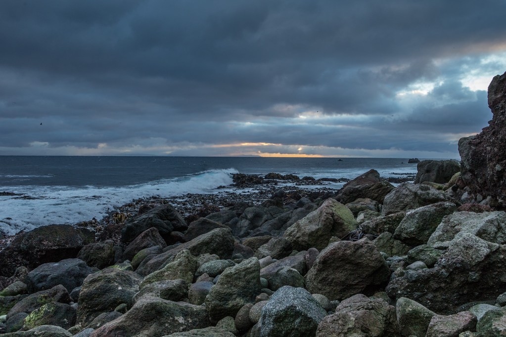 Moody landscape view looking out from Solander Island