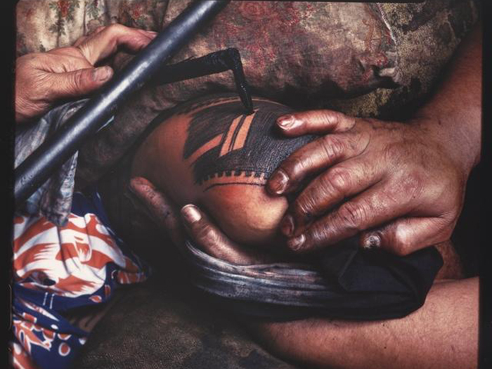 Samoan tatau being undertaken 1982