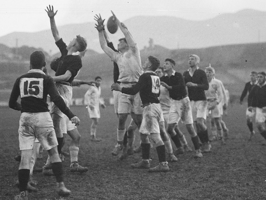 rugby_sport_tile.jpg A black and white photo of two teams playing rugby