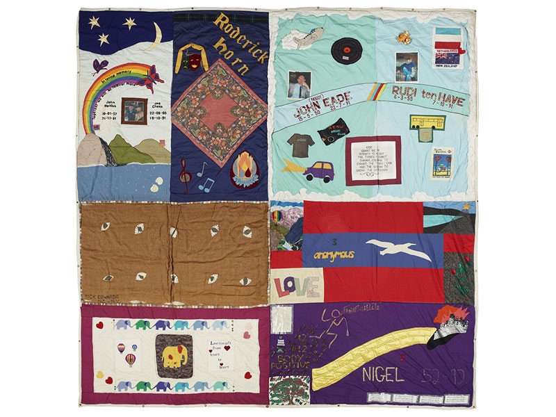 New Zealand AIDS Memorial Quilt, 1991–1992, New Zealand. Gift of The New Zealand AIDS Memorial Quilt, 2011. Te Papa (GH017445) Quilt consisting of 8 vividly coloured panels dedicated to people who died of AIDS. Each panel contains a mixture of words and pictures