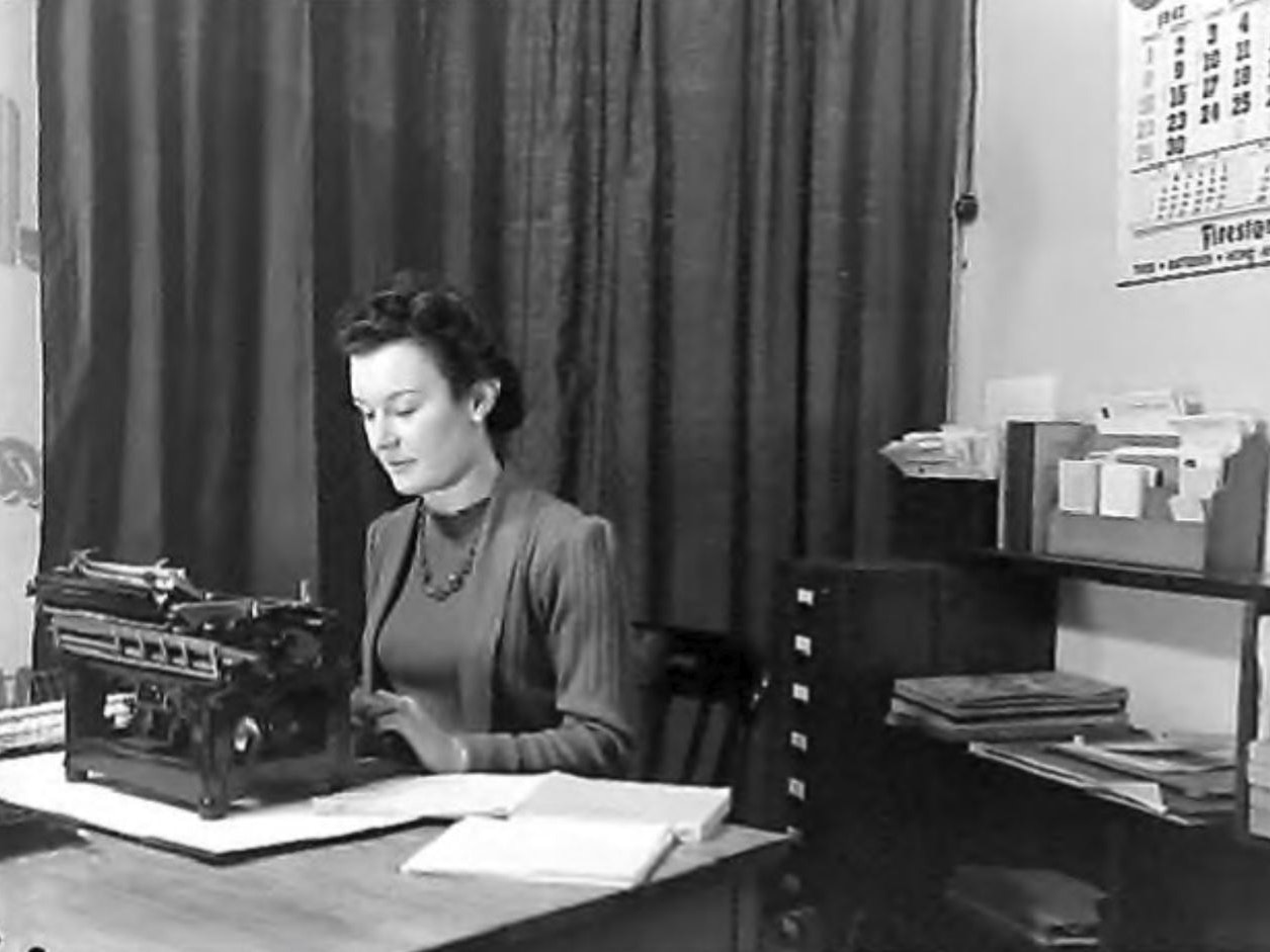 Woman at Desk, 1947, by Gordon Burt, Gordon H. Burt Ltd. Te Papa (B.026730) Woman at desk