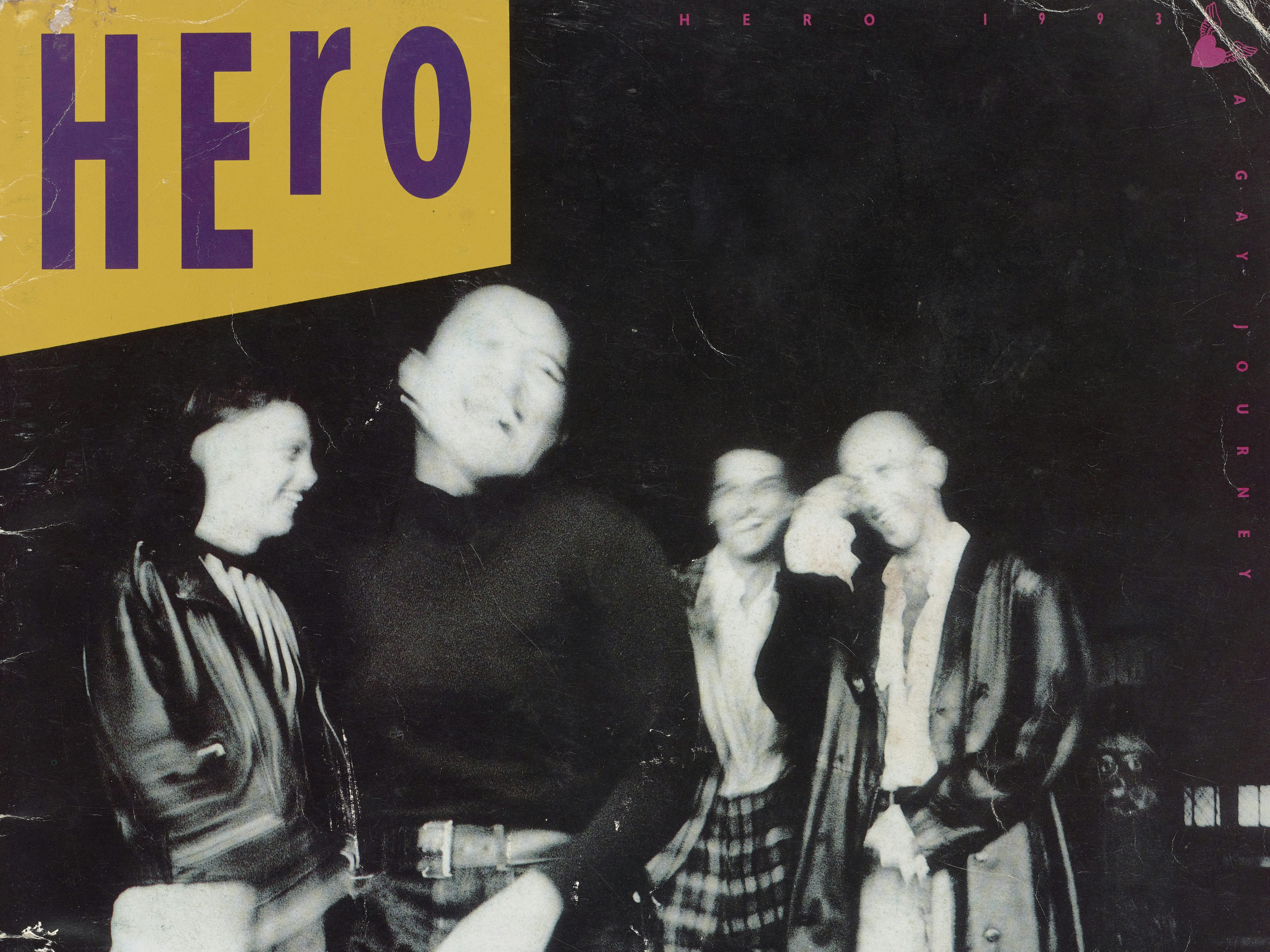 Crop of Hero programme,The HERO Project Limited,1993; New ZealandGift of Te Herekiekie Herewini, 2011. Te Papa (CA001013/001/0002) Black and white blurry photo of four people and the word Hero on the top-left corner