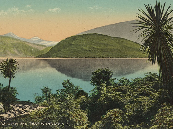 Glendhu, Lake Wanaka, New Zealand, 1908-1910, Lake Wanaka, by Muir & Moodie studio. Purchased 1998 with New Zealand Lottery Grants Board funds. Te Papa (PS.000974/01) Detail of a colour postcard of Lake Wanaka with bush in the foreground, the lake in the middle, and hills in the background