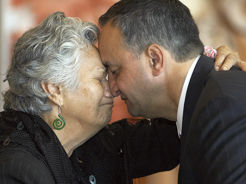 A man and a woman pressing noses