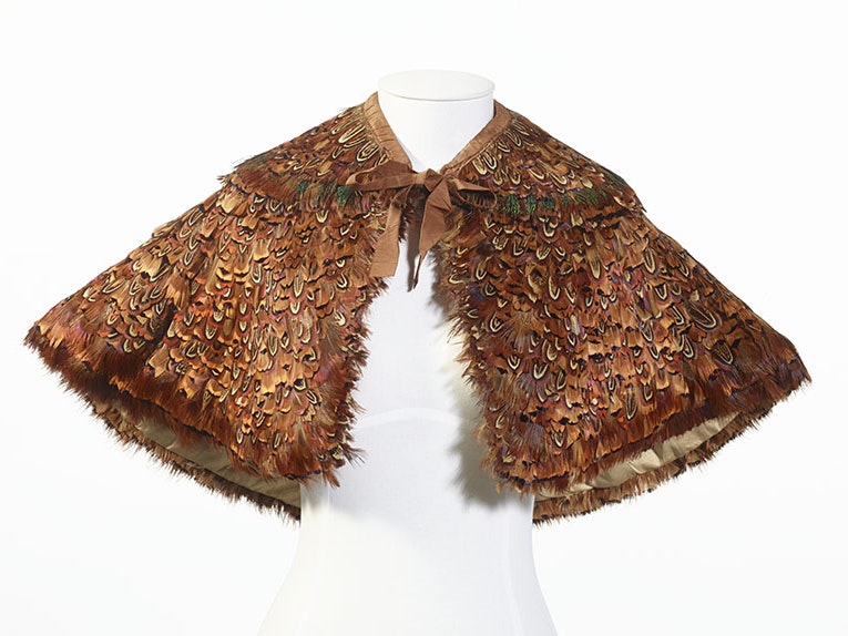 Feather pelerine, United Kingdom, maker unknown. CC BY-NC-ND 4.0. Te Papa (GH016753) A hand-stitched feather pelerine with a detachable collar, using pheasant feathers