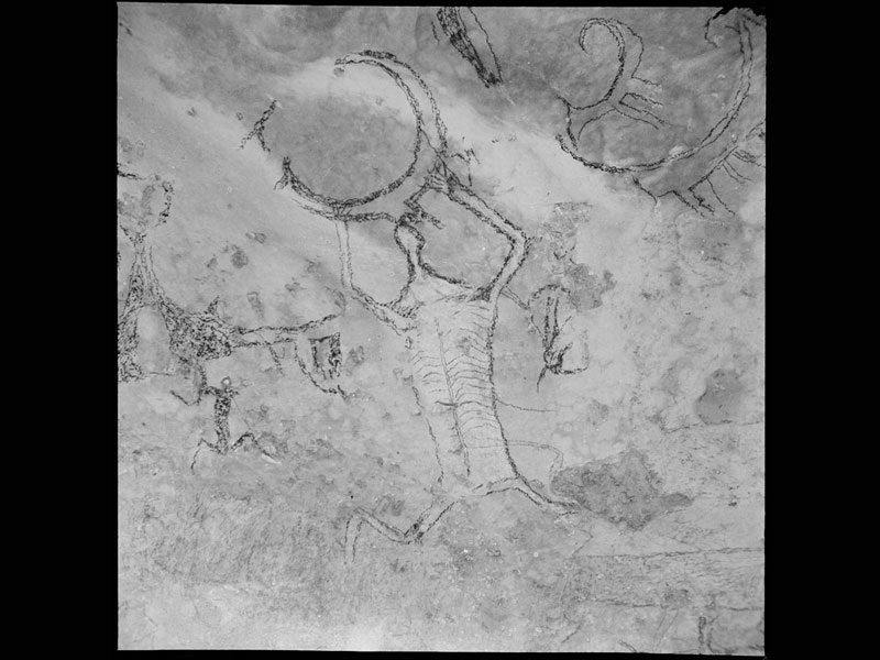 Rock art drawing which includes a human figure