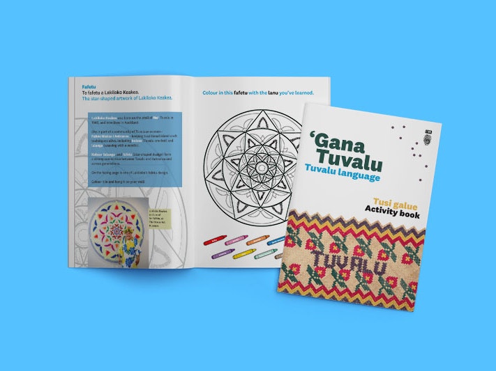 Tuvalu language activity book, 2021. Te Papa. Mockup Photoshop template by FreePik user user17882893 Mockup of an open Tuvalu language activity book