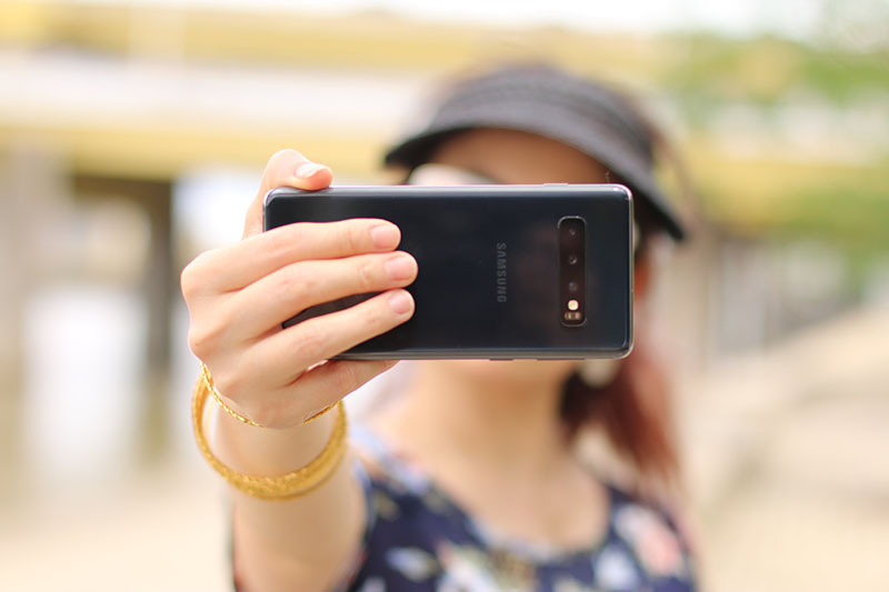 A woman taking a selfie