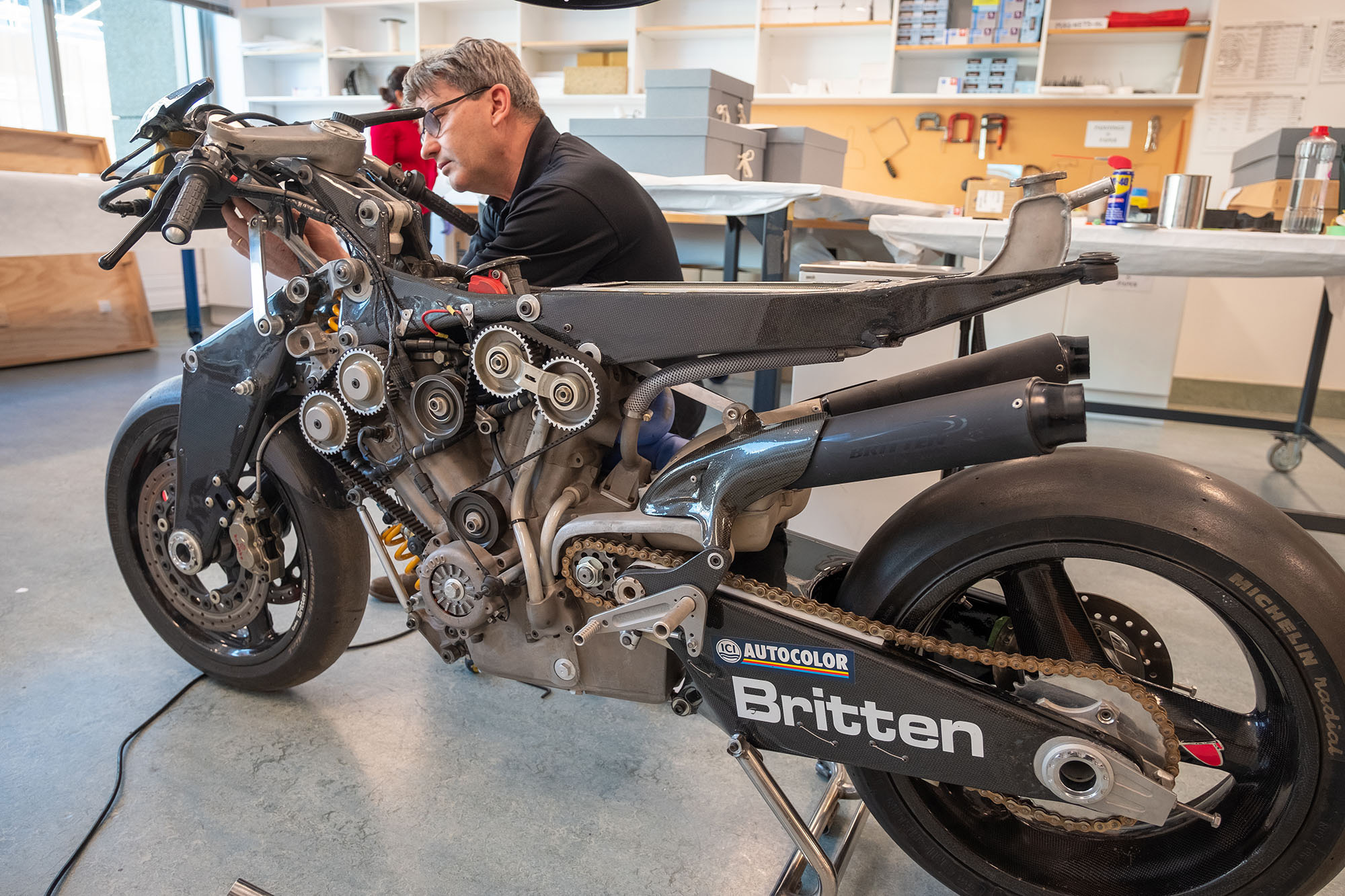 Craig looks at the front of the Britten Bike