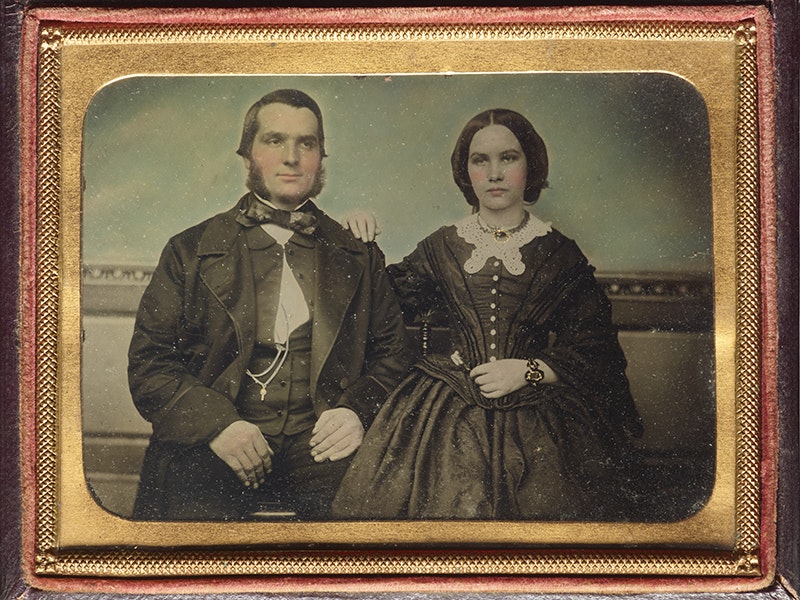 Couple, 1850s, maker unknown. Purchased 2014. CC BY-NC-ND 4.0. Te Papa (O.041106) A studio photograph of a man and a woman that has been hand coloured