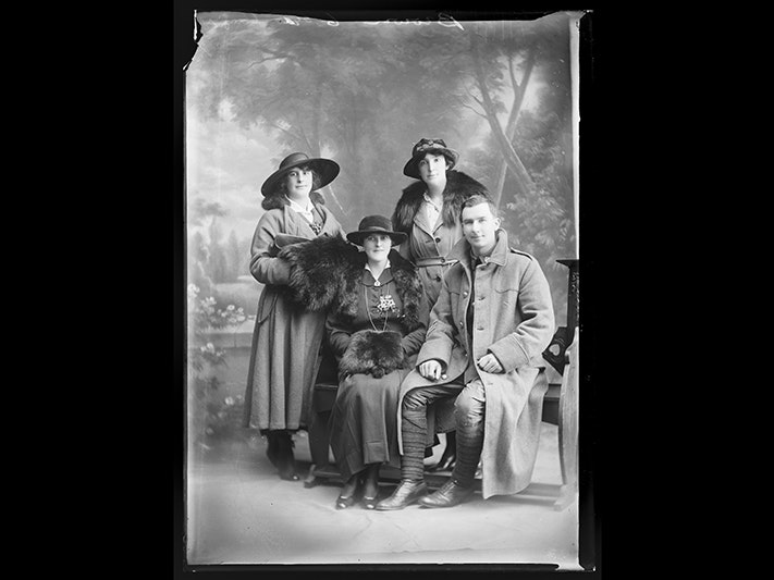 George Onslow Browne, his wife Florence Daisy and sisters Louisa May and Annis Mary, July 1918, Wellington, by Berry & Co. Purchased 1998 with New Zealand Lottery Grants Board funds. Te Papa (B.044944) People standing in a studio looking at the camera and wearing fur on their coats and clothing
