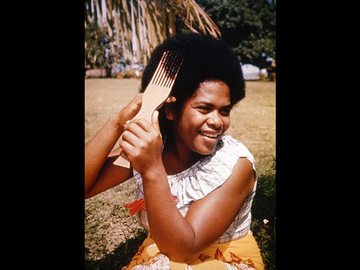Fiji Woman by Brett Jordan, 2011, via Flickr CC BY 2.0 A woman combing her afro hair with a long-toothed comb