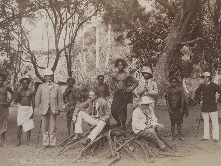 Nai-Koro-Koro, Levuka, Fiji, July '84, 1884, Dunedin, by Burton Brothers, Alfred Burton. Purchased 1981 with New Zealand Lottery Board funds. Te Papa (O.002020) A black and white photo showing the colonists and Indigenous people of Fiji