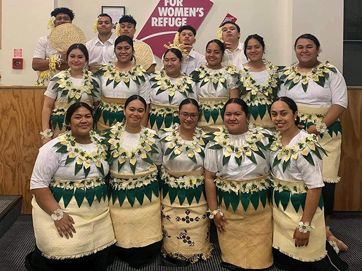 Victoria University Tongan Students Association 2021 cohort. Photo by Fugalaau Mafi, courtesy of Malia Pole‘o A group of young men and women pose for a photo - they are all wearing the same outfit