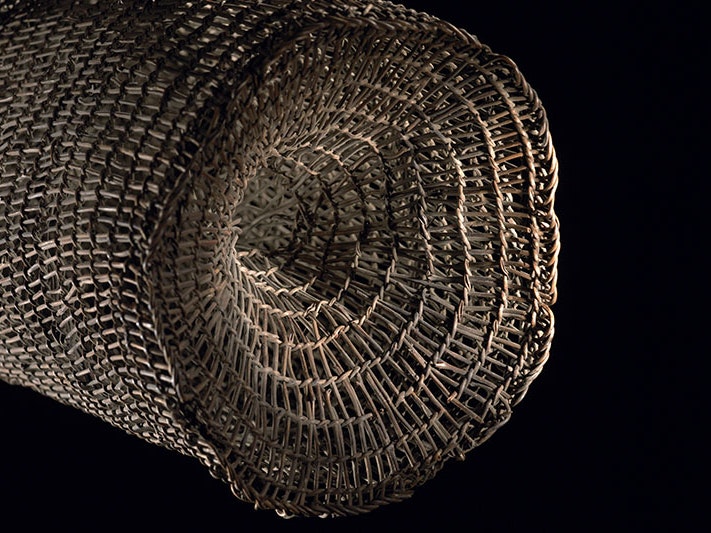 Hīnaki (eel trap), maker unknown, 1800-1900, Whanganui. Te Papa (ME008102) Close-up of a hīnaki (eel trap) showing its weavings