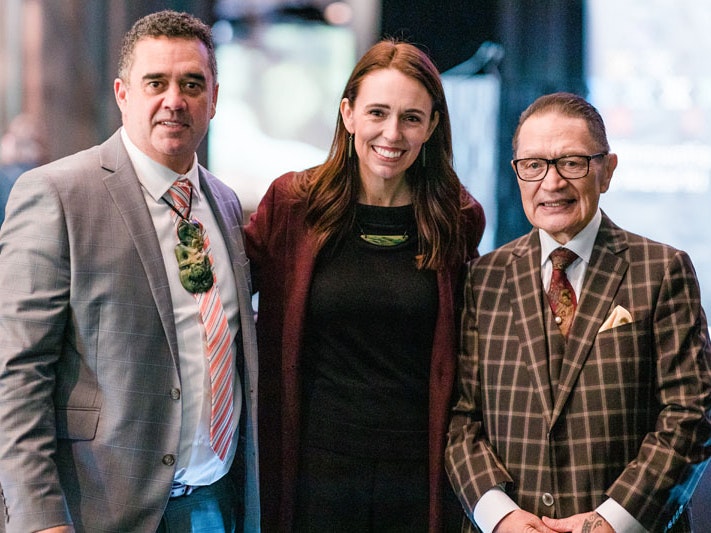 Rangi Matamua, then-Prime Minister Jacinda Ardern, and Sir Pou Temara at the Matariki hautapu, 24 Jun 2022. Photo by Erica Sinclair. Te Papa Rangi Matamua, then-Prime Minister Jacinda Ardern, and Sir Pou Temara pose for a group photo