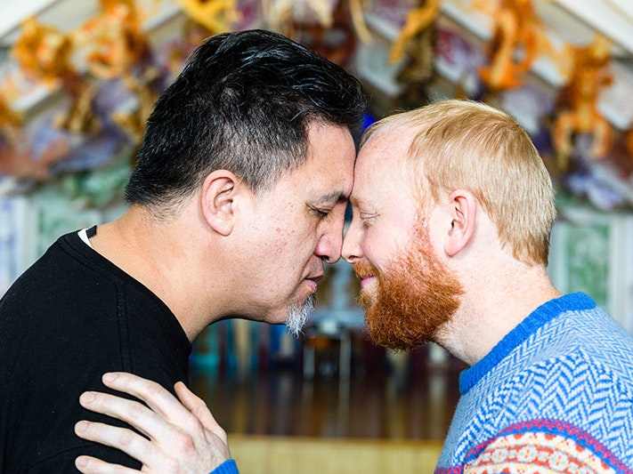 Hongi, 2017. Photo by Mark Coote. Te Papa (107052) Two men press their noses together for hongi