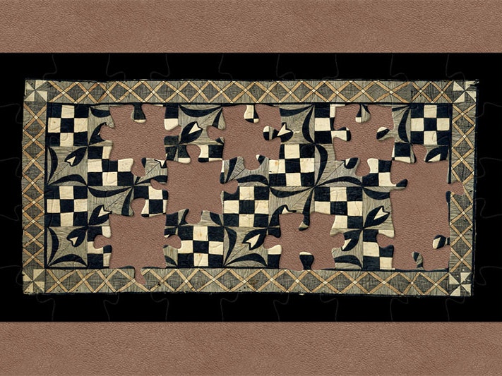 Siapo (tapa cloth), about 1917, Samoa, maker unknown. Gift of Thomas Trood, 1917. Te Papa (FE001423) Tapa cloth. The border is a network of orange Xs, while the internal patterns alternate between checkerboards and flowers
