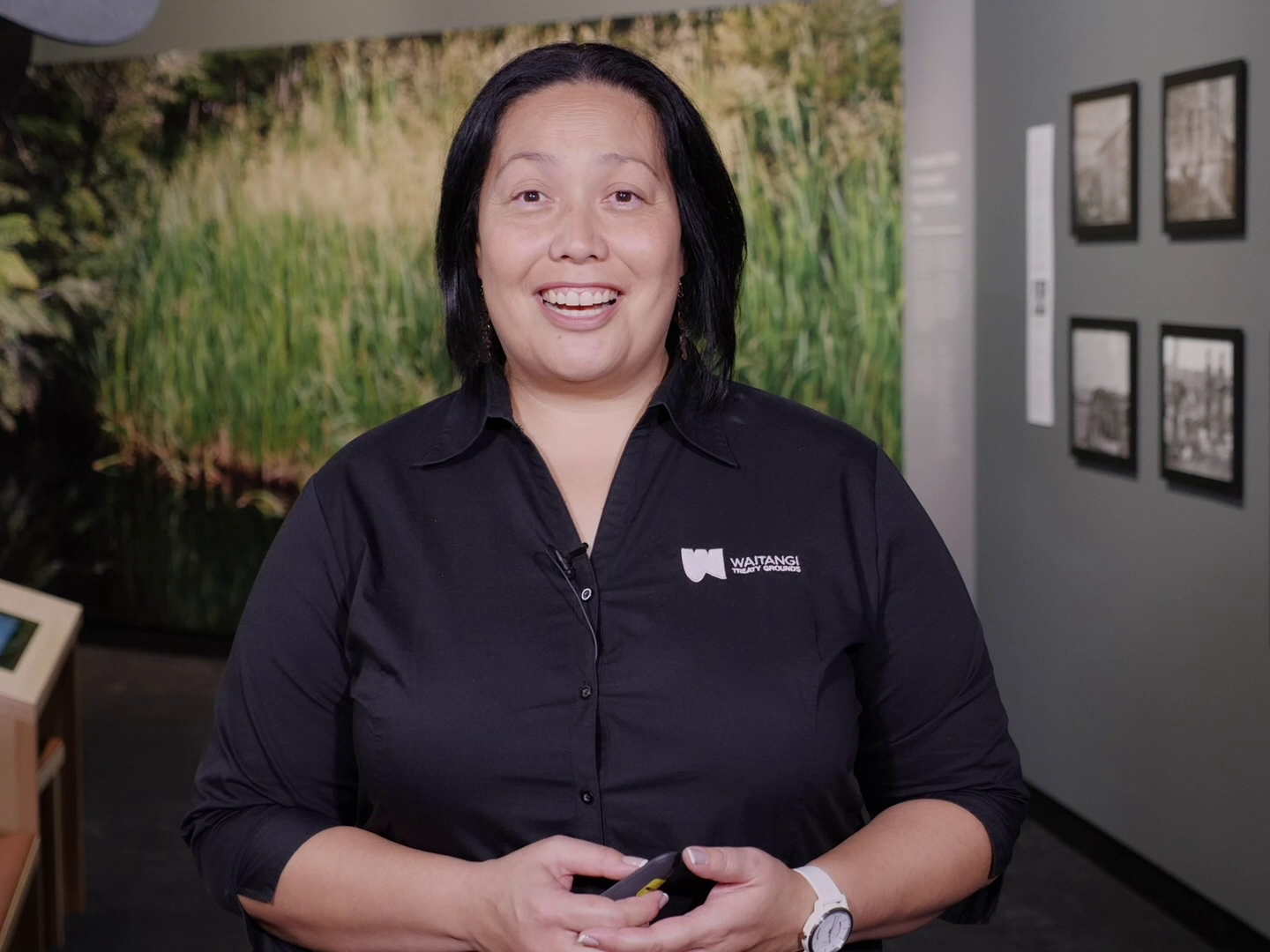 A still from Raranga Matahiko 3a and 3b. Te Papa A woman talking in a darkened room
