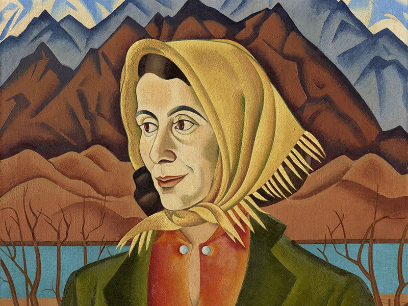 Rita Angus, Marjorie Marshall, 1938–39/1943, oil on canvas adhered to plywood. Te Papa (2019-0012-1) Oil painting of a woman. She is looking to the left out of frame. She is wear a yellow shawl, an orange blouse, and a dark green jacket. Behind her are imposing mountains and a river