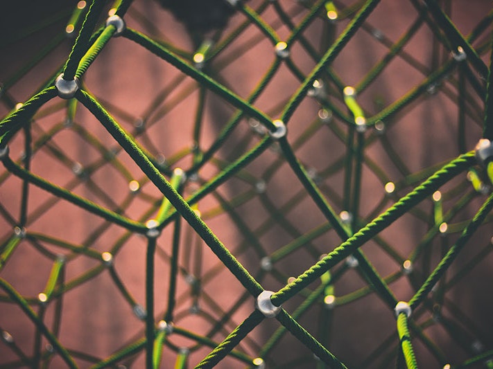 Rope, 2016. Photo by Clint Adair / Unsplash Close up of rope connected together like mesh