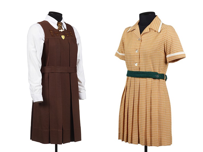 Girl's school tunic, mid 1950s, New Zealand, by Wellington Woollen Manufacturing Company. Gift of Wellington High School, 2009. CC BY-NC-ND 4.0. Te Papa (GH016880) and Queen Victoria Maori Boarding School girl's Sunday Best uniform, George Courts & Sons L Two girls school uniforms on dressmaker dummies
