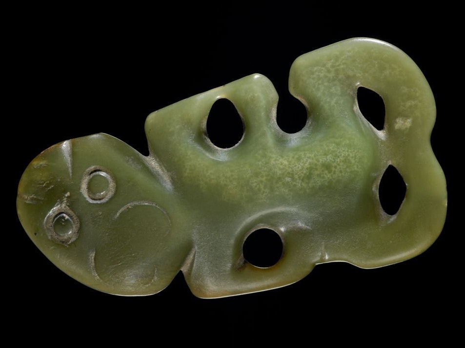 Hei tiki (pendant in human form), 1600-1850, Waipiro Bay, maker unknown. Purchased 1972. Te Papa (ME012716) A pounamu or greenstone pendant in human form.