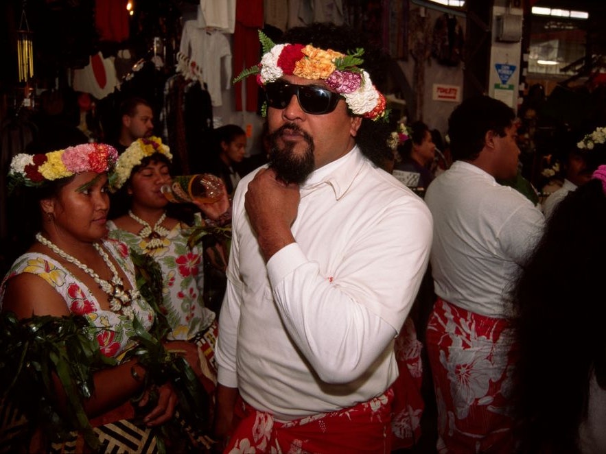 Tuvalu dance group Members of a Tuvalu dance group, focused on a man in sunglasses.