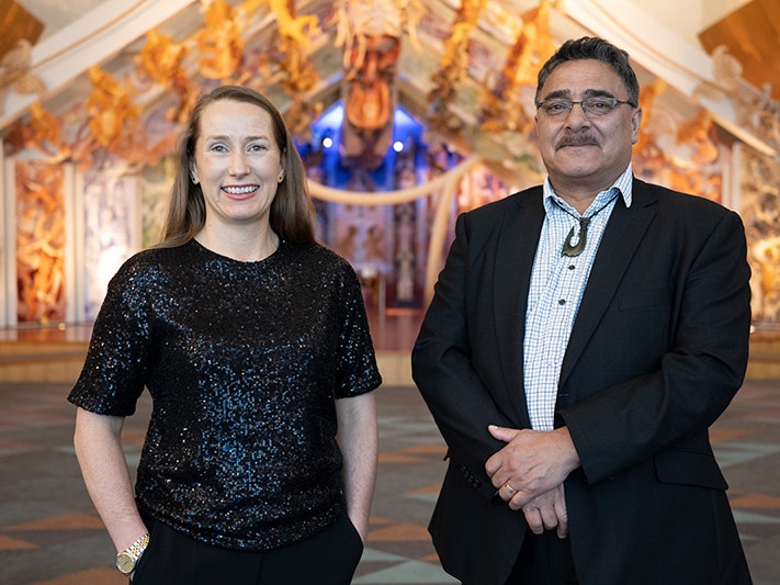 Tumu Whakarae Courtney Johnston and Kaihautū Arapata Hakiwai, 2021. Photo by Daniel Rose. (174729) A woman and a man are standing together in the contemporary marae at Te Papa