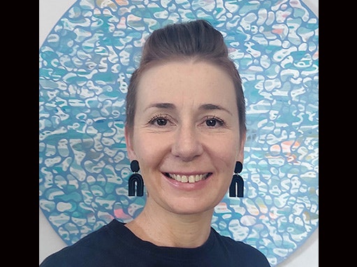 Rachel Haydon Head and shoulders of a woman smiling at the camera.