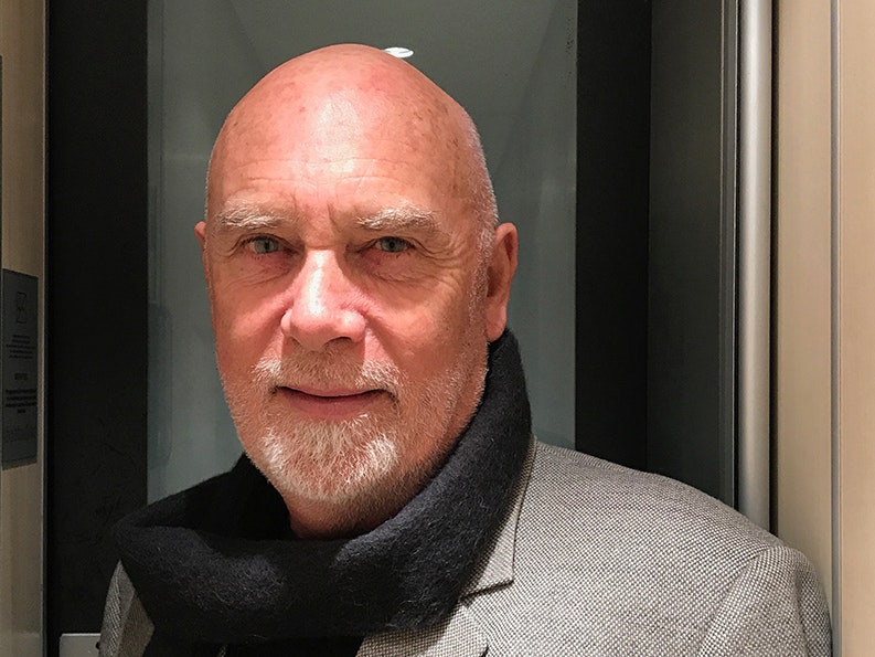 Glenn Busch. Photo by Trish Allen A man with a goatee and no hair is looking at the camera.