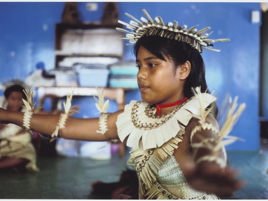 O.033021; Dance rehearsal; 1999; Whincup, Tony A young girl in a dance costume from Kiribati