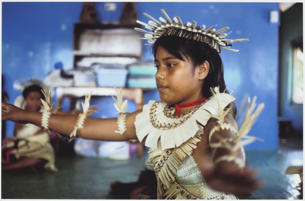 A young girl in a dance costume from Kiribati