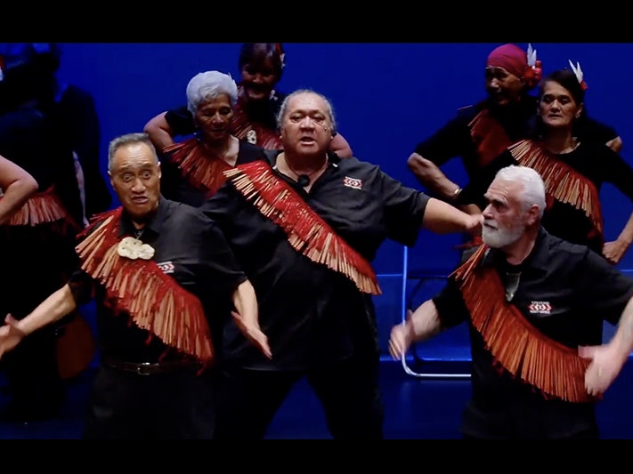 Tūhourangi Ngāti Wāhiao Koeke Kapa Haka at Taikura 2025 Several older people performing kapa haka Māori performance on a stage.