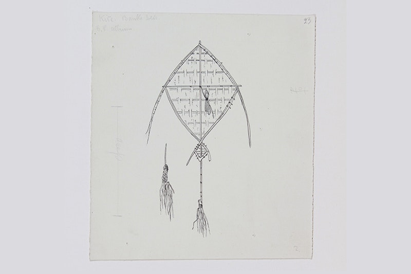A pencil drawing of a kite on a piece of paper