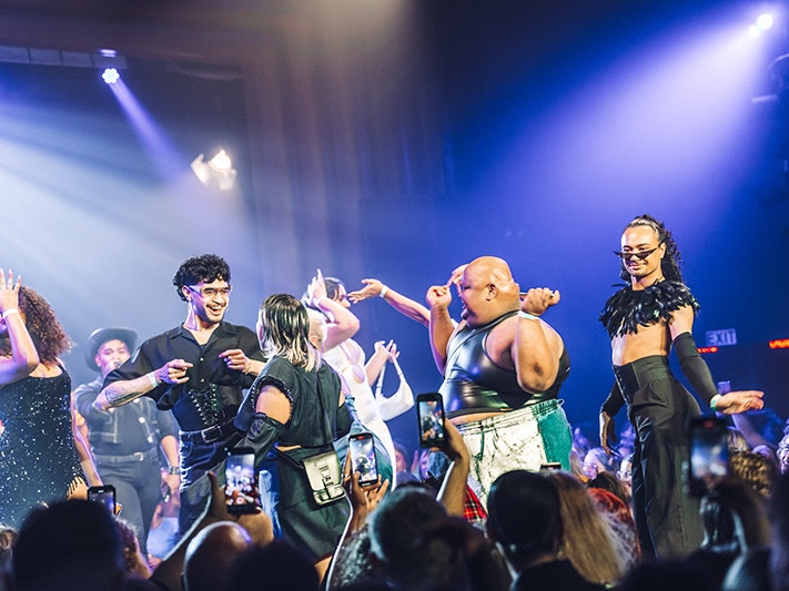 The Kiki House of Marama House Debut at the 4th Annual Alexander Ball 2023 (Brisbane, AUS). Photo by Larry Lim, People Talk Co People dancing and voguing with spotlights shining on them.