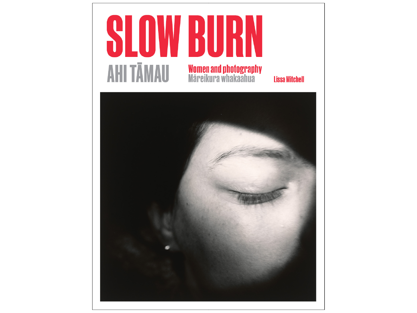 Book cover for Slow Burn, with a close-up black-and-white photograph of a woman's face half in shadow