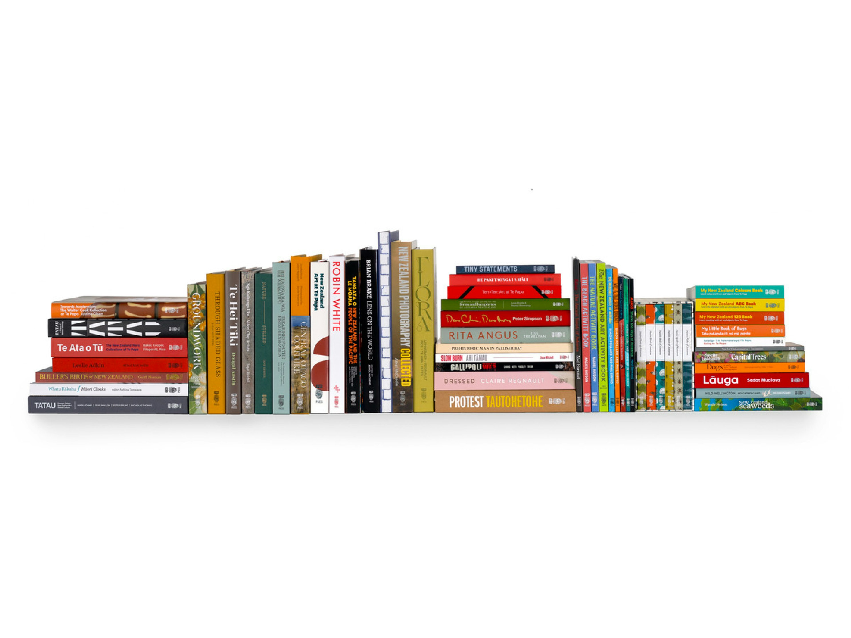 books stacked upright and in piles