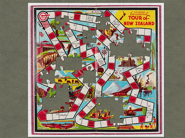 Board game Tour of New Zealand; 1950s; Thomas Holdsworth & Sons Ltd. Gift of Andrea Hill, 2009. Te Papa (GH012785;) An image of a board game with jigsaw-shaped pieces missing